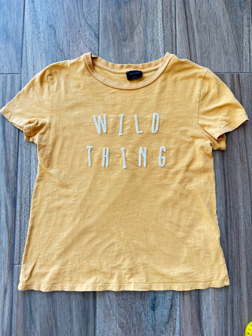 “Wild Thing” Mustard Yellow Graphic Tee. Women’s Size Small